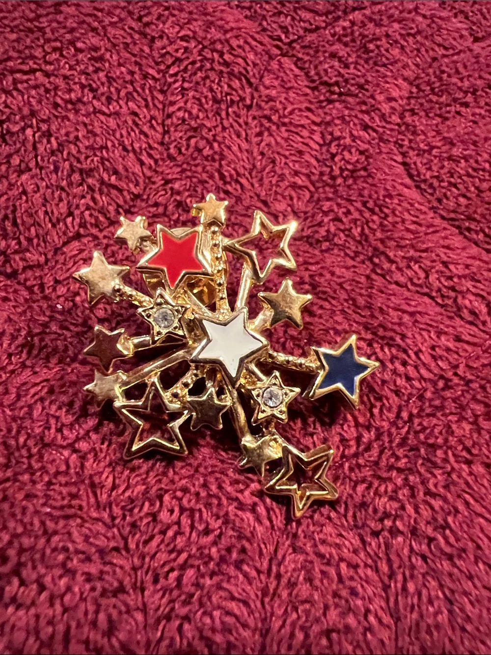 Avon Gold-tone Starburst pin with Red White and Blue Enamel